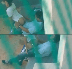 The teacher is caught holding a student in his uniform